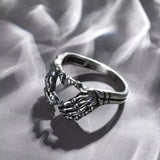Vintage Punk Skull Hand with Heart-Shaped Ring - animalsaso02