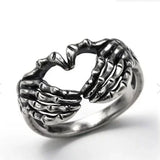 Vintage Punk Skull Hand with Heart-Shaped Ring - animalsaso02