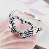 Vintage Punk Skull Hand with Heart-Shaped Ring - animalsaso02